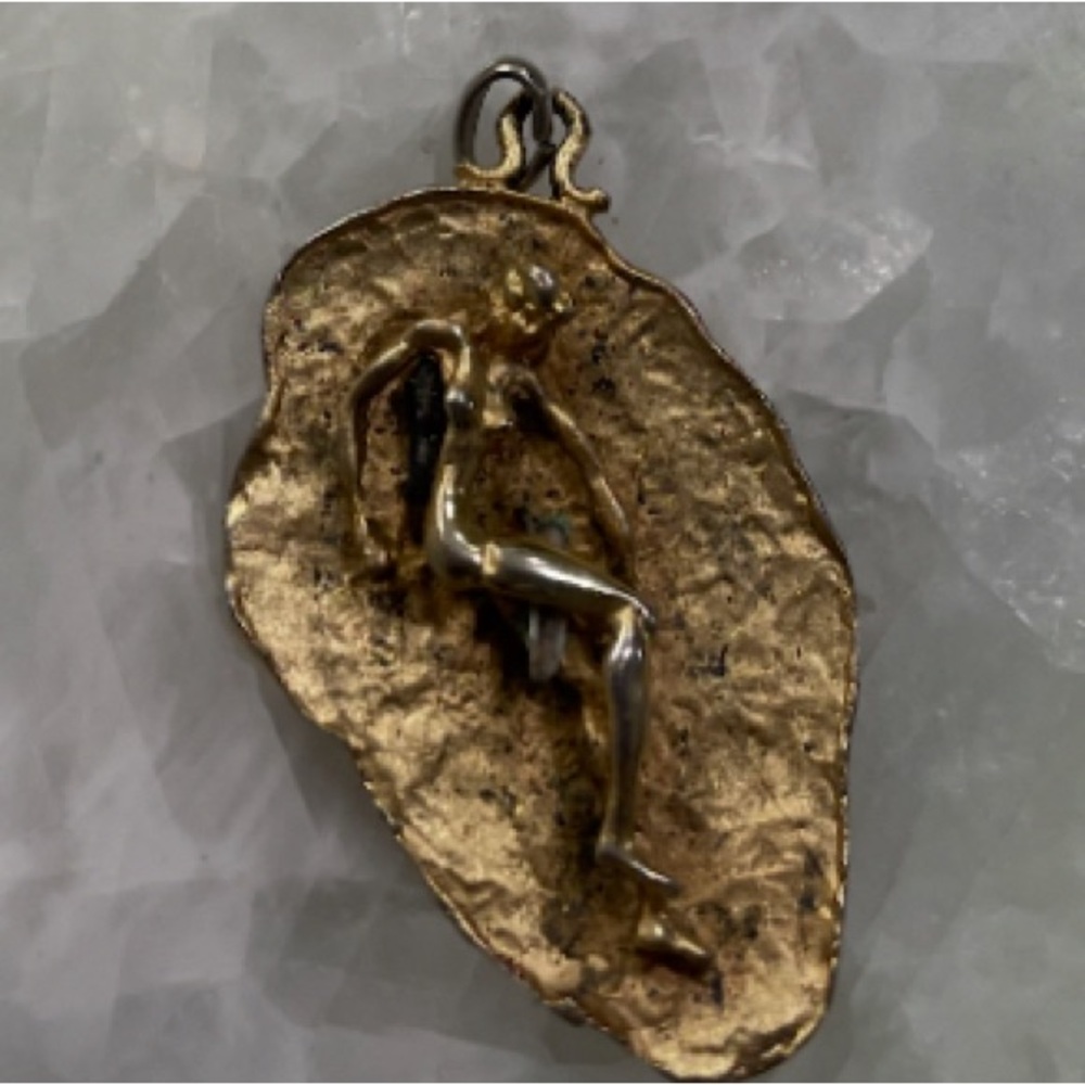Elegant Gold and Silver Pendant